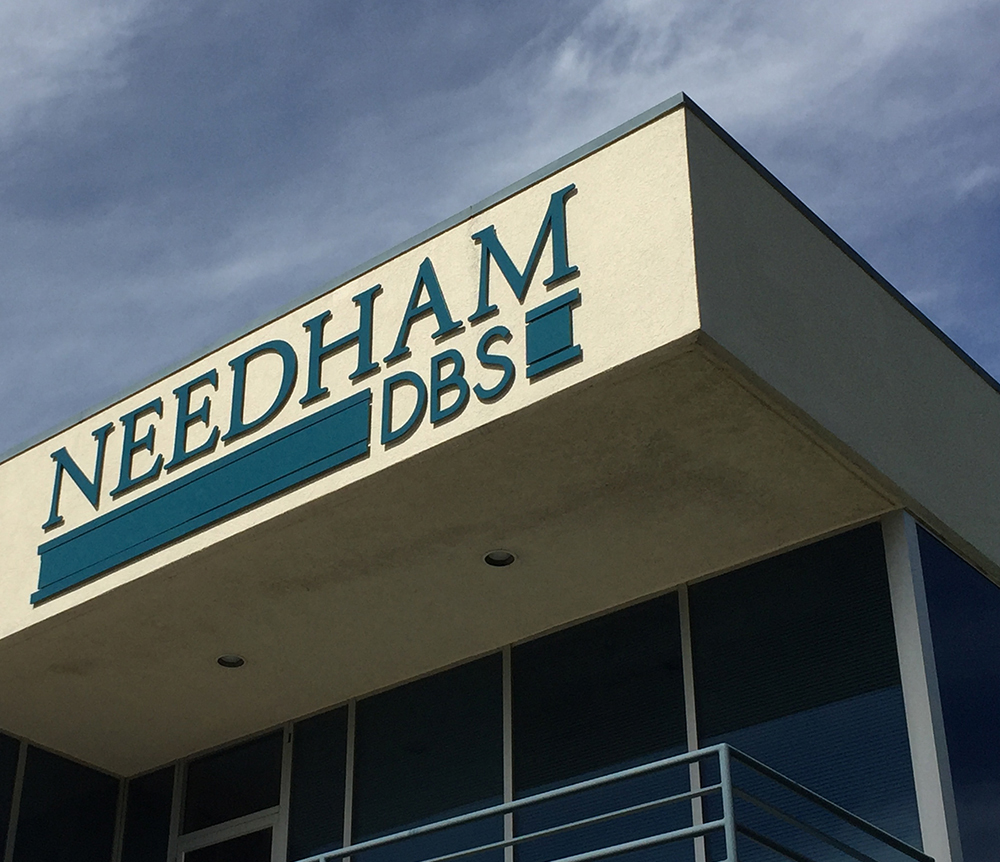Needham DBS building signage design by The Common Sense Creative